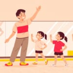 鏡のあるダンススタジオで、先生の動きをまねして初めてのダンスに挑戦する小学生たちのイラスト